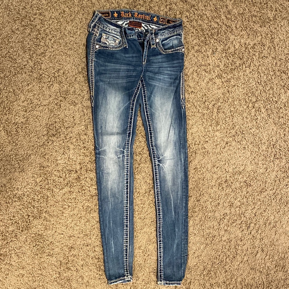 Size: 25 Rock Revival Skinny Jeans